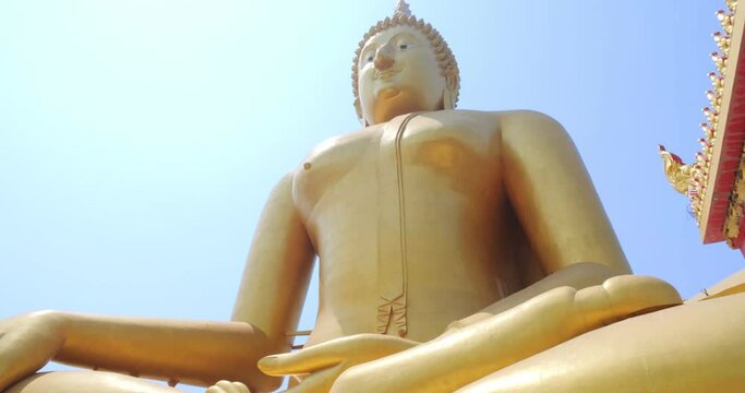 Big buddha statue The glittering golden color is beautiful. Wat Muang, Ang Thong Province, Thailand