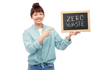 asian woman holds chalkboard with zero waste words