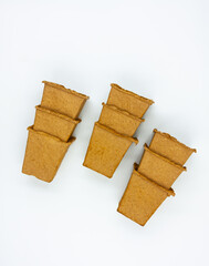 Paper grow your own seedling pot isolated on white background.