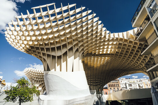 SEVILLE, ANDALUSIA, SPAIN - APRIL 10 2019: The Mushrooms, Metropol Parasol (Setas de Sevilla) white wooden pergola in Plaza de la Encarnation. Historic and modern city Seville, Andalusia, Spain.