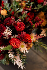 red elegant wedding bouquet of fresh natural flowers