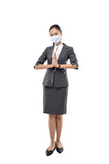 standing business woman wearing health mask with hand welcoming guests and white wall background