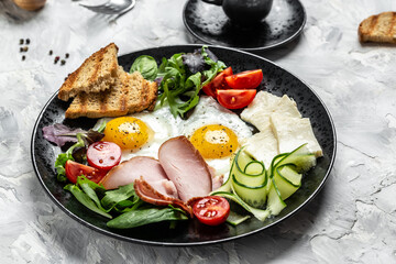 English breakfast Fried eggs with toast and ham and coffee. banner, menu recipe, top view