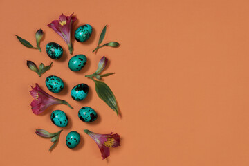 Colored Easter eggs in green on an yellow  background. Minimal easter concept. Easter spring holiday background.