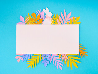 Fototapeta na wymiar Easter greeting card. Paper blank on blue background. Flat lay, top view, copy space.