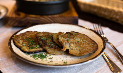 Traditional Belarusian dish. Hot draniki served on plate