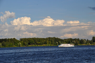 Panoramic view of the Volga and the passing pleasure boat.