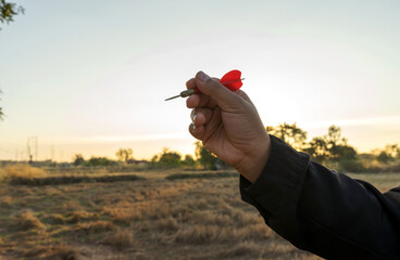 Success goals Targeting the business concept. Businessman throwing red arrow dart to virtual...
