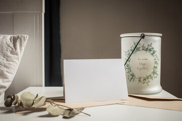 blank greeting card  invitation mockup with craft paper envelope  feminine still life composition