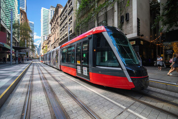 Naklejka premium Tram moving through George St in Sydney NSW Australia