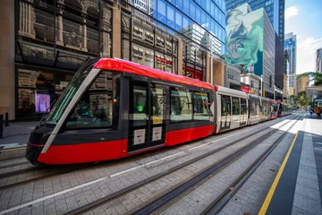 Foto op Plexiglas Tram moving through George St in Sydney NSW Australia © Elias Bitar