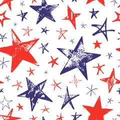 Seamless pattern with red and blue hand drawn vector stars in doodle style on white background. 