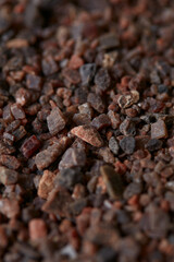 rock himalayan salt on black stone surface