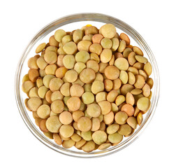 green lentils in a glass bowl isolated on white background