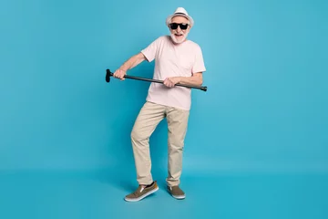 Foto op Canvas Full length body size photo senior man wearing casual outfit dancing at party isolated vivid blue color background © deagreez
