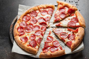 pizza cheese, sausage, tomato sauce meal top view copy space food background rustic