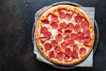 pizza cheese, sausage, tomato sauce meal top view copy space food background rustic