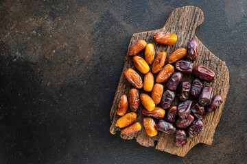 date fruit healthy sweet dried fruits tasty snack diet top view copy space  vegan or vegetarian...