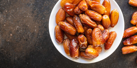 date fruit healthy sweet dried fruits tasty snack diet top view copy space  vegan or vegetarian...
