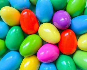 Easter.  Multicolored bright colorful Easter eggs close-up for background.  Easter holiday concept.  View from above.  Background texture of Easter eggs.