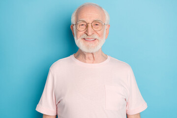 Photo of aged man happy positive smile toothy ceramic veneers clinic isolated over blue color background