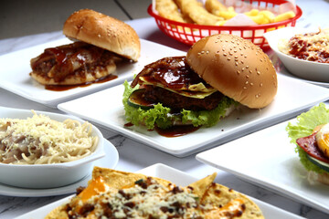 Freshly made giant hamburger sandwich with cheese and vegetables