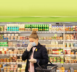 supermarket shopping, face mask and gloves,Woman choosing frozen food from a supermarket freezer