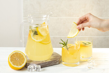 Summer citrus lemonade with orange, lemon and rosemary