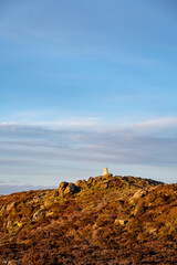 Trigonometry point on top of The Roaches at sunset in the Peak District National Park.