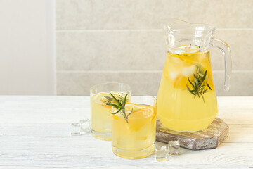 Summer citrus lemonade with orange, lemon and rosemary