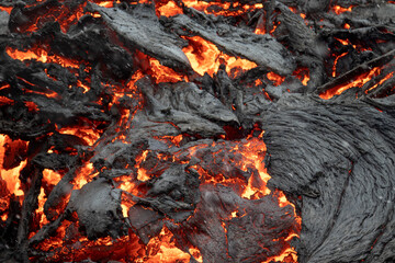 Flowing  lava close up. Volcano eruption at Fagradalsfjall, Iceland.