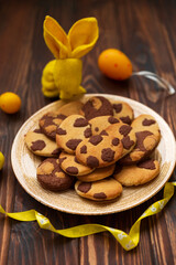 Beautiful Easter egg shaped cookies on wooden table