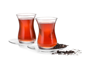 Glasses of tasty Turkish tea on white background