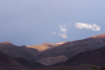 High in the mountains. The Andes cordillera at sunrise. Beautiful rock texture and morning colors and contrast. 