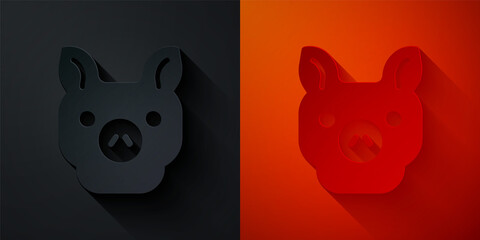 Obraz premium Paper cut Pig icon isolated on black and red background. Animal symbol. Paper art style. Vector