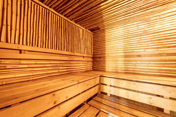 Sauna interior. Wooden homemade traditional sauna. Spa wellness at hotel treatment