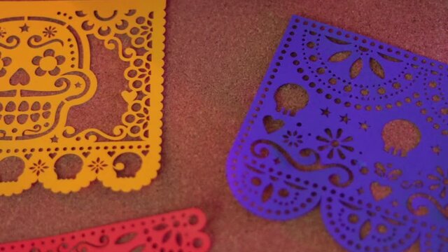 Mexican traditions, papel picado for d&iacute;a de muertos. Panning, long video.