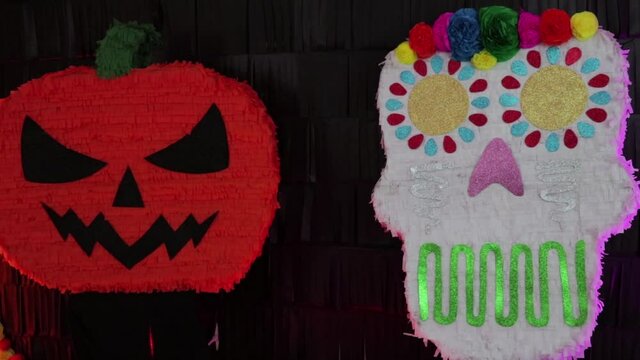 Halloween and d&iacute;a de muertos (day of the dead) decoration. Pumpkin and clavera (skull).