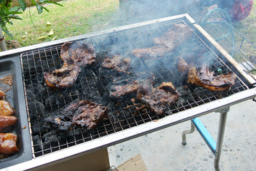 Marinated mutton with spices, grilled and smoked using controlled charcoal fire.