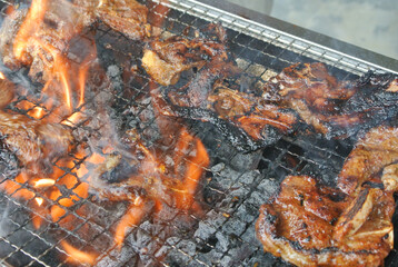 Marinated mutton with spices, grilled and smoked using controlled charcoal fire.