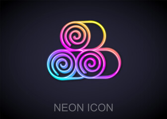 Glowing neon line Roll of hay icon isolated on black background. Vector