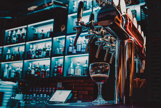 many beer taps in bar or pub