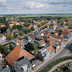 Fototapeta na wymiar Aldeboarn in Heerenveen Friesland Netherlands. Arial views from the churchtower of the village. 1990.