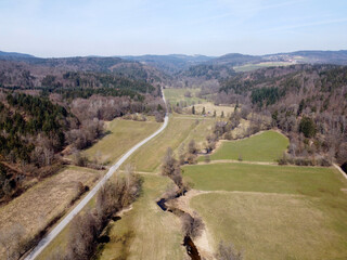 A brook  river stream  in Bavaria, aerial view photographed with a drone in winter