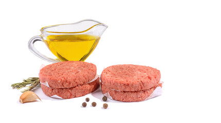 Raw beef patties for making a burger.Isolated on a white background.Selective Focus.