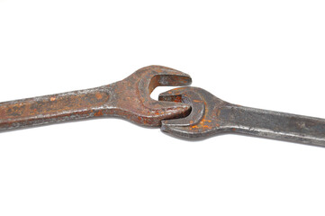 Rusty wrenches, bolts and nuts on white background close up. Tool, old, rare, vintage, macro, DIY, spanner
