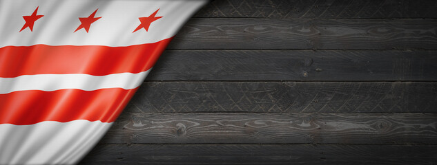 Fototapeta premium Washington, District of Columbia flag on black wood wall banner, USA