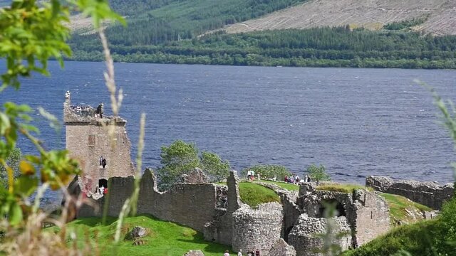Still slow motion shot of Urquhart Castle stone ruins in Loch Ness Scotland Drumnadrochit Tourism Scottish Highlands UK 1920x1080 HD