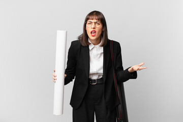 woman looking angry, annoyed and frustrated screaming wtf or what’s wrong with you