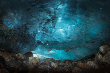 relief texture of blue ice inside the Alibeksky glacier in Dombai